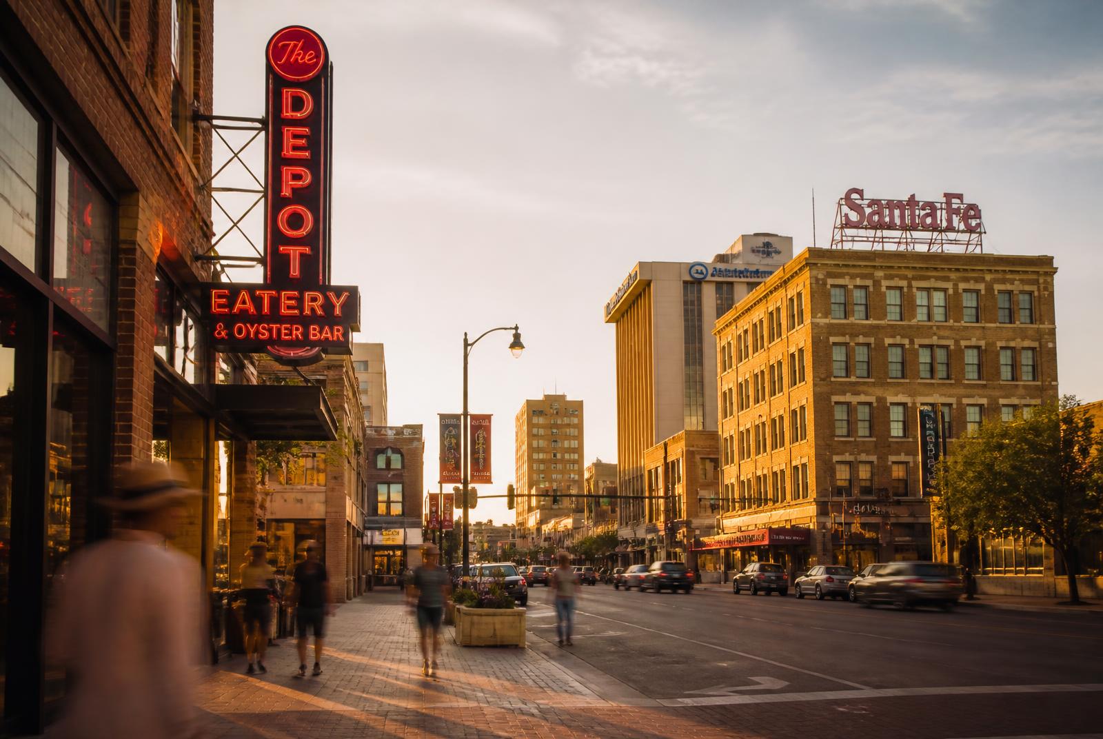 Downtown Amarillo street scene at golden hour with historic brick buildings